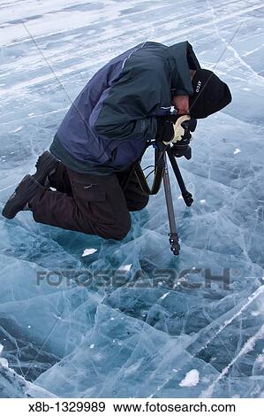 Canadian photographer Gilles Pucheu at work near his home in Yellowknife, Northwest Territories, Canada View Large Photo Image Stock Photo - Canadian photographer Gilles Pucheu at work near his home in Yellowknife, Northwest Territories, Canada. Fotosearch