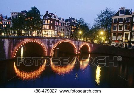 Canal bridge at night, Prinsengracht, Amsterdam. Holland View Large Photo Image Stock Photo - Canal bridge at night, Prinsengracht, Amsterdam. Holland. Fotosearch