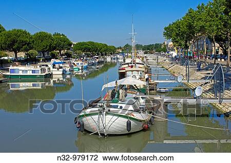 Canal du Rhone at Sete. Beaucaire. Bouches-du-Rh? ne. Gard departament. Provence. France. View Large Photo Image Stock Image - Canal du Rhone at Sete. Beaucaire. Bouches-du-Rh? ne. Gard departament. Provence. France.. Fotosearch