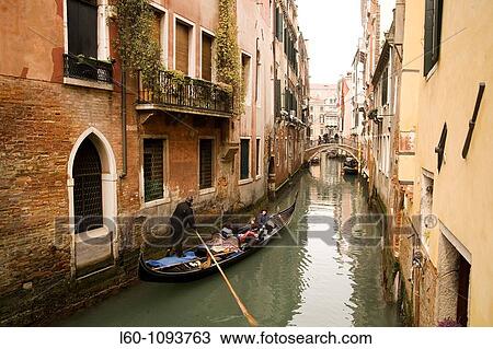 Stock Image - Canal in Venice, Veneto, Italy. Fotosearch