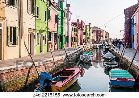 Stock Photography - Canal with boats and colorful houses on island Burano. Venice, Veneto region, Italy, Europe.. Fotosearch