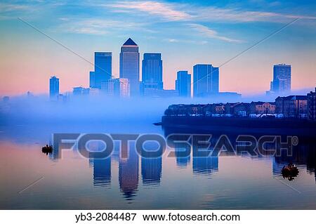 Canary Wharf Financial District Through The Fog, London, England. View Large Photo Image Stock Photo - Canary Wharf Financial District Through The Fog, London, England.. Fotosearch