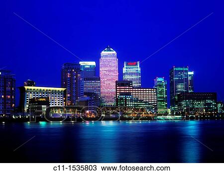 canary wharf isle of dogs from across river thames dusk sunset london england uk View Large Photo Image Stock Image - canary wharf isle of dogs from across river thames dusk sunset london england uk. Fotosearch