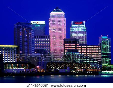canary wharf isle of dogs from across river thames dusk sunset london england uk View Large Photo Image Stock Image - canary wharf isle of dogs from across river thames dusk sunset london england uk. Fotosearch