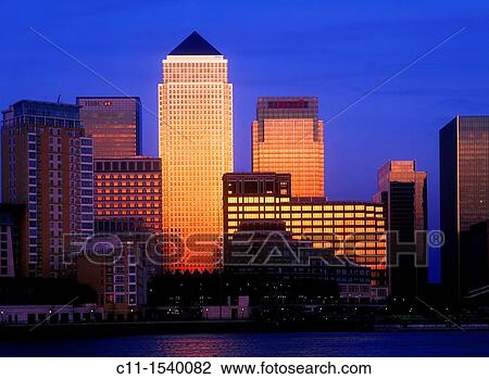 canary wharf isle of dogs from across river thames dusk sunset london england uk View Large Photo Image Stock Image - canary wharf isle of dogs from across river thames dusk sunset london england uk. Fotosearch