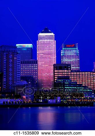 canary wharf isle of dogs from across river thames dusk sunset london england uk View Large Photo Image Stock Photo - canary wharf isle of dogs from across river thames dusk sunset london england uk. Fotosearch