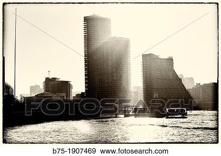Canary Wharf, London, England, UK, backlight of a building of modern architecture on the river Thames View Large Photo Image Stock Photo - Canary Wharf, London, England, UK, backlight of a building of modern architecture on the river Thames. Fotosearch