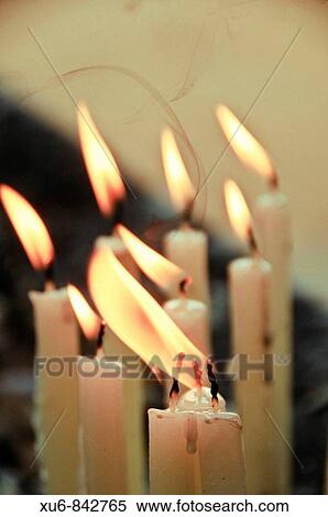 Stock Photography - Candles burning at a Christian shrine Vypeen Island, Kerala, India. Fotosearch