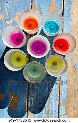 Candles circle over blue wood View Large Photo Image Stock Photography - Candles circle over blue wood. Fotosearch