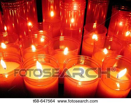 Candles in church View Large Photo Image Picture - Candles in church. Fotosearch