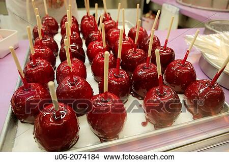 Candy apples for sale and on display at a county fair in Canada View Large Photo Image Picture - Candy apples for sale and on display at a county fair in Canada. Fotosearch