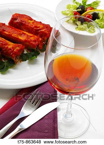 Cannelloni with meat, vegetables and tomato sauce View Large Photo Image Stock Photo - Cannelloni with meat, vegetables and tomato sauce. Fotosearch