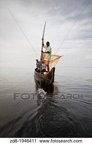 Stock Image - canoe in vembanad lake. india.. Fotosearch