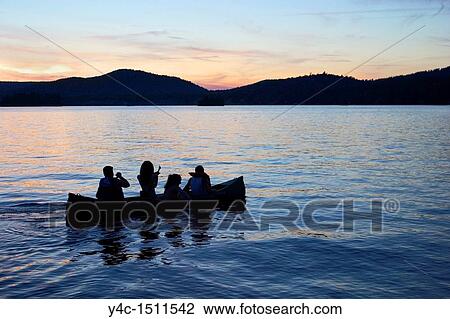 Canoe on Fourth Lake at sunset, Inlet, New York, Adirondack Mountains View Large Photo Image Stock Image - Canoe on Fourth Lake at sunset, Inlet, New York, Adirondack Mountains. Fotosearch