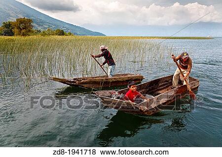 Stock Photo - canoes in atitlan lake. guatemala. Fotosearch