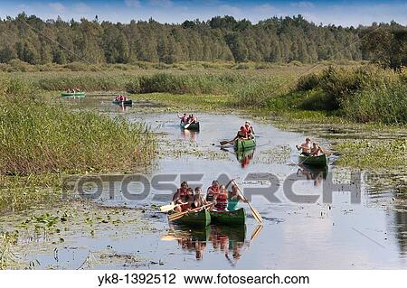 Canoes on Elva River in Estonia View Large Photo Image Stock Image - Canoes on Elva River in Estonia. Fotosearch