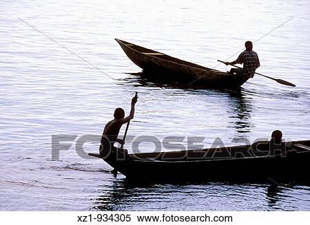 Canoes on Lobe river, Kribi, South Province, Cameroon View Large Photo Image Stock Photography - Canoes on Lobe river, Kribi, South Province, Cameroon. Fotosearch