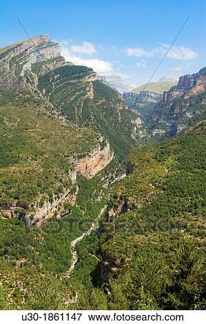 Canyon of Aisclo Valley, belonging to Ordesa y Monte Perdido National Park Pyrenees Fanlo Huesca province Arag? n Spain View Large Photo Image Stock Photo - Canyon of Aisclo Valley, belonging to Ordesa y Monte Perdido National Park Pyrenees Fanlo Huesca province Arag? n Spain. Fotosearch