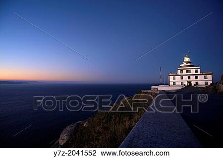 Cape Finisterre lighthouse at dawn. View Large Photo Image Stock Image - Cape Finisterre lighthouse at dawn.. Fotosearch