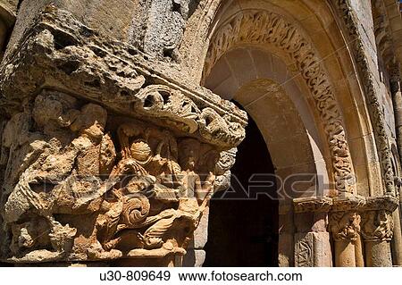 Capitals and columns carved with bas of the romanesque church porticoed of San Juan y Santa Bas? lica; in Rebolledo de la Torre, in northern Burgos, Castilla y Le? n, Spain, Europe. View Large Photo Image Stock Photo - Capitals and columns carved with bas of the romanesque church porticoed of San Juan y Santa Bas? lica; in Rebolledo de la Torre, in northern Burgos, Castilla y Le? n, Spain, Europe.. Fotosearch