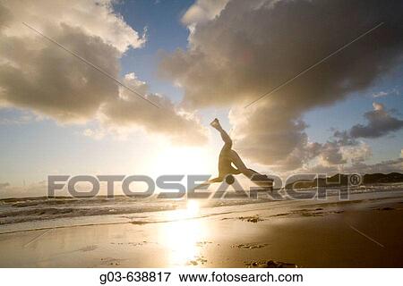 Capoeira player training and exercising in the beach, Brazil. View Large Photo Image Stock Photo - Capoeira player training and exercising in the beach, Brazil.. Fotosearch