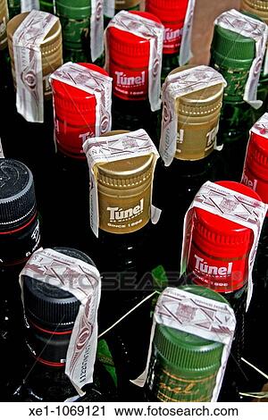 Caps of liquor bottles. View Large Photo Image Stock Image - Caps of liquor bottles.. Fotosearch