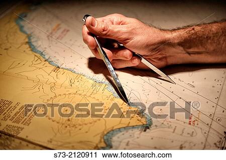 Captain setting the compasses View Large Photo Image Stock Image - Captain setting the compasses. Fotosearch
