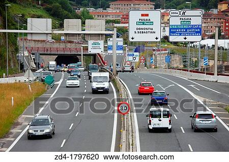 Car and truck traffic on the motorway, Gipuzkoa, Basque Country, Spain View Large Photo Image Stock Image - Car and truck traffic on the motorway, Gipuzkoa, Basque Country, Spain. Fotosearch