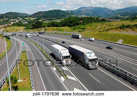 Car and truck traffic on the motorway, Gipuzkoa, Basque Country, Spain View Large Photo Image Stock Photograph - Car and truck traffic on the motorway, Gipuzkoa, Basque Country, Spain. Fotosearch