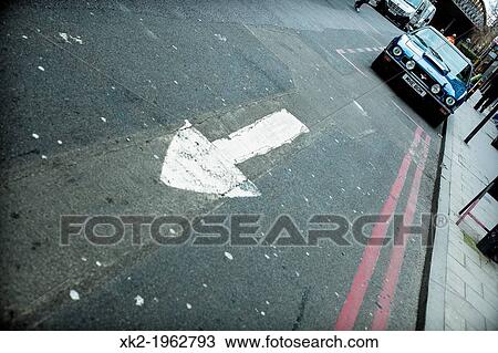 Car direction arrow and a blue classical Ford mustang in London View Large Photo Image Stock Image - Car direction arrow and a blue classical Ford mustang in London. Fotosearch