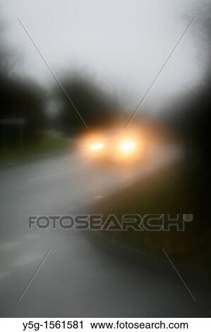 car driving in heavy rain on rural country road View Large Photo Image Stock Image - car driving in heavy rain on rural country road. Fotosearch
