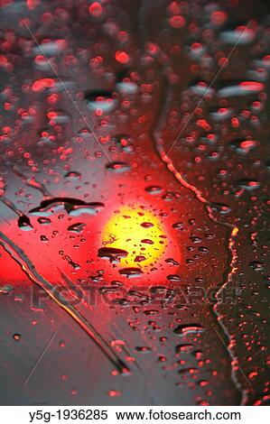 car lights in rain at night View Large Photo Image Stock Photography - car lights in rain at night. Fotosearch