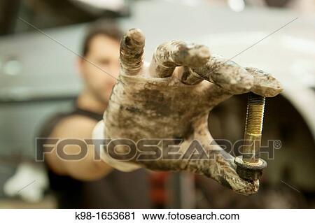 Stock Image - Car mechanic, repair garage. Fotosearch