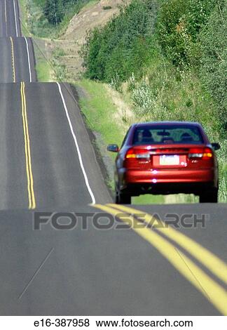 car on endless highway in Alaska View Large Photo Image Stock Photo - car on endless highway in Alaska. Fotosearch