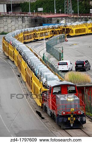Car Transport by rail, transportation of cars and light commercial vehicles, Pasajes Port, Gipuzkoa, Basque Country, Spain View Large Photo Image Stock Photo - Car Transport by rail, transportation of cars and light commercial vehicles, Pasajes Port, Gipuzkoa, Basque Country, Spain. Fotosearch