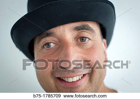 Cara de hombre de mediana edad con sombrero, Face of middle aged man with hat, View Large Photo Image Stock Photo - Cara de hombre de mediana edad con sombrero, Face of middle aged man with hat,. Fotosearch