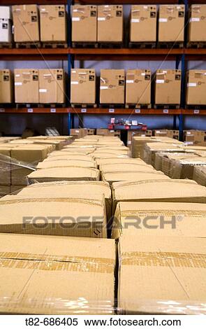 Cardboard boxes in warehouse View Large Photo Image Stock Photography - Cardboard boxes in warehouse. Fotosearch