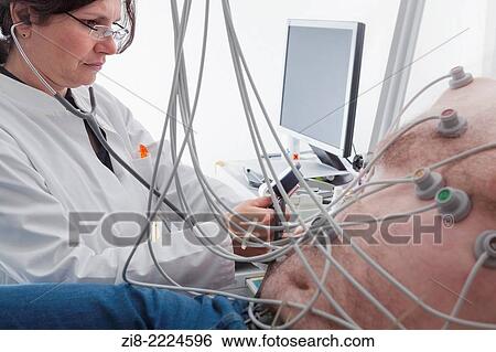 Cardiovascular stress testing-cardiologist checks blood pressure of overweight male patient. View Large Photo Image Stock Photograph - Cardiovascular stress testing-cardiologist checks blood pressure of overweight male patient.. Fotosearch