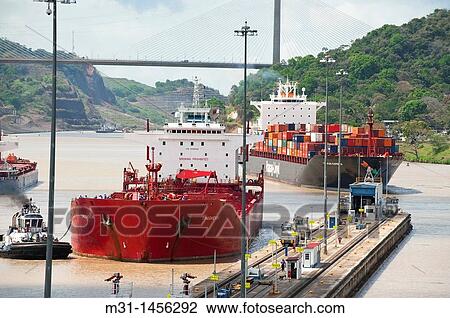 Cargo ships arriving to Pedro Miguel Locks Panama Canal, Panama City, Panama, Central America View Large Photo Image Stock Image - Cargo ships arriving to Pedro Miguel Locks Panama Canal, Panama City, Panama, Central America. Fotosearch
