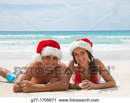 Caribbean Barbados Couple with Santa hat. View Large Photo Image Stock Image - Caribbean Barbados Couple with Santa hat.. Fotosearch