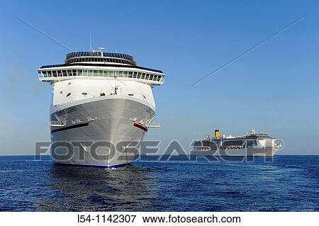 Caribbean Cruise Ship docking at the Cayman Islands in the caribbean View Large Photo Image Stock Photo - Caribbean Cruise Ship docking at the Cayman Islands in the caribbean. Fotosearch