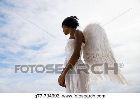 Caribbean Dominican Republic Samana Peninsula Las Terrenas Woman with angel's wings View Large Photo Image Stock Image - Caribbean Dominican Republic Samana Peninsula Las Terrenas Woman with angel's wings. Fotosearch