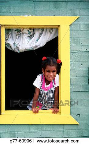 Caribbean girl at window. Willemstad. Cura? ao, Netherlands Antilles View Large Photo Image Stock Image - Caribbean girl at window. Willemstad. Cura? ao, Netherlands Antilles. Fotosearch