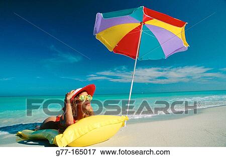 Stock Photo - Caribbean, Woman on beach. Cuba, Varadero. Fotosearch