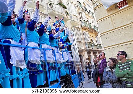 Stock Photograph - Carnival. Parade of choirs in Calle Ancha. CBdiz, Andalusia, Spain.. Fotosearch