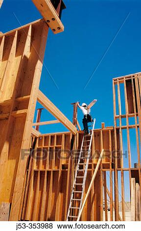 Carpenter climbing ladder. East Antelope, California. USA. View Large Photo Image Stock Photo - Carpenter climbing ladder. East Antelope, California. USA.. Fotosearch
