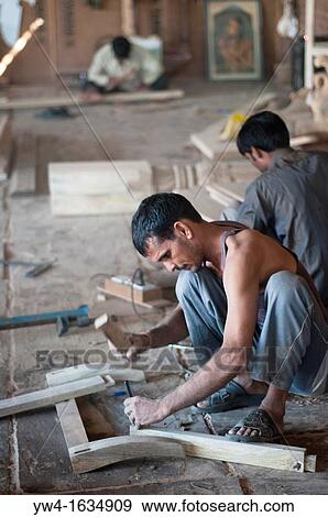 Carpenter in Cabinet making workshop, Jaipur, Rajasthan, India View Large Photo Image Stock Photo - Carpenter in Cabinet making workshop, Jaipur, Rajasthan, India. Fotosearch