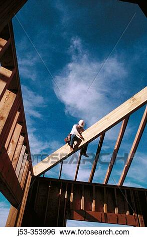 Carpenter making rafters. Grass Valley. California. USA. View Large Photo Image Stock Photograph - Carpenter making rafters. Grass Valley. California. USA.. Fotosearch