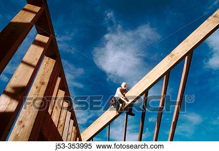 Carpenter making rafters. Grass Valley. California. USA. View Large Photo Image Stock Photography - Carpenter making rafters. Grass Valley. California. USA.. Fotosearch