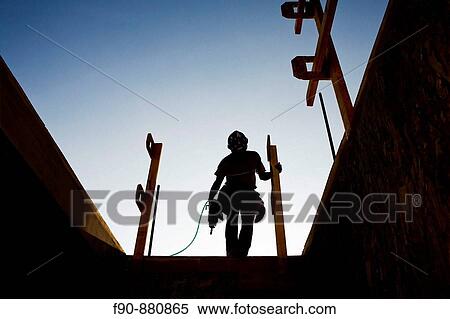 Carpenter silhouette condo construction Los Angeles View Large Photo Image Stock Photography - Carpenter silhouette condo construction Los Angeles. Fotosearch